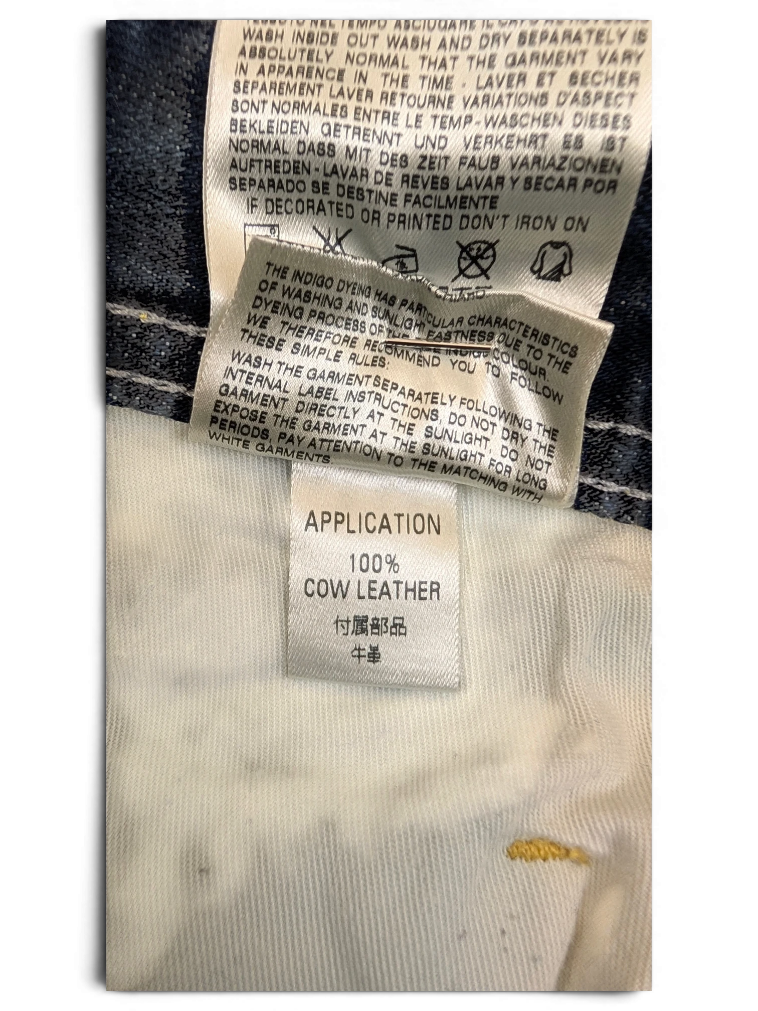 JAKE & IPI Diesel Poiak jeans label showing 100% cow leather application.