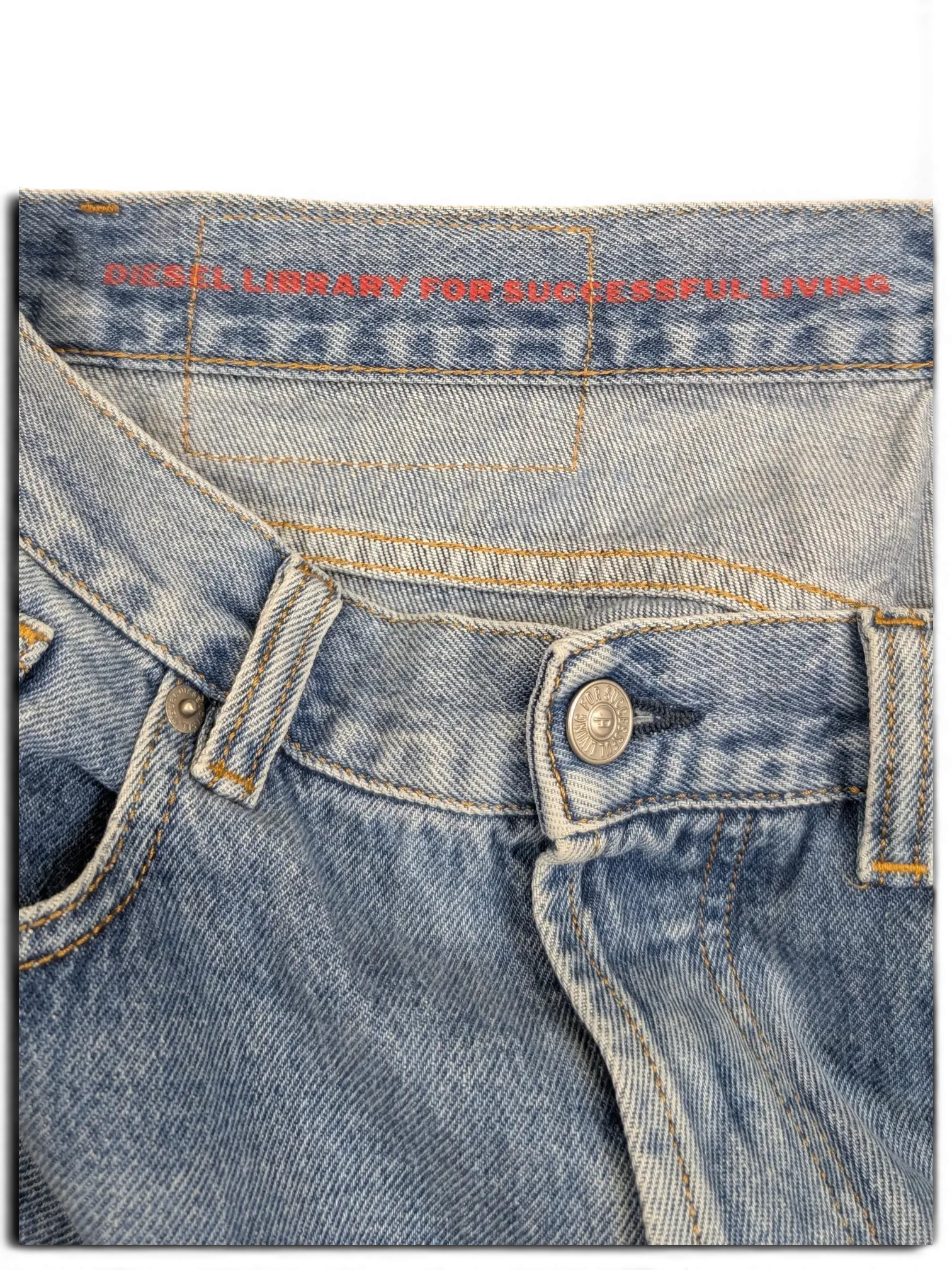 JAKE & IPI light wash denim jeans with red Diesel Library for Successful Living tag. W30 L30.