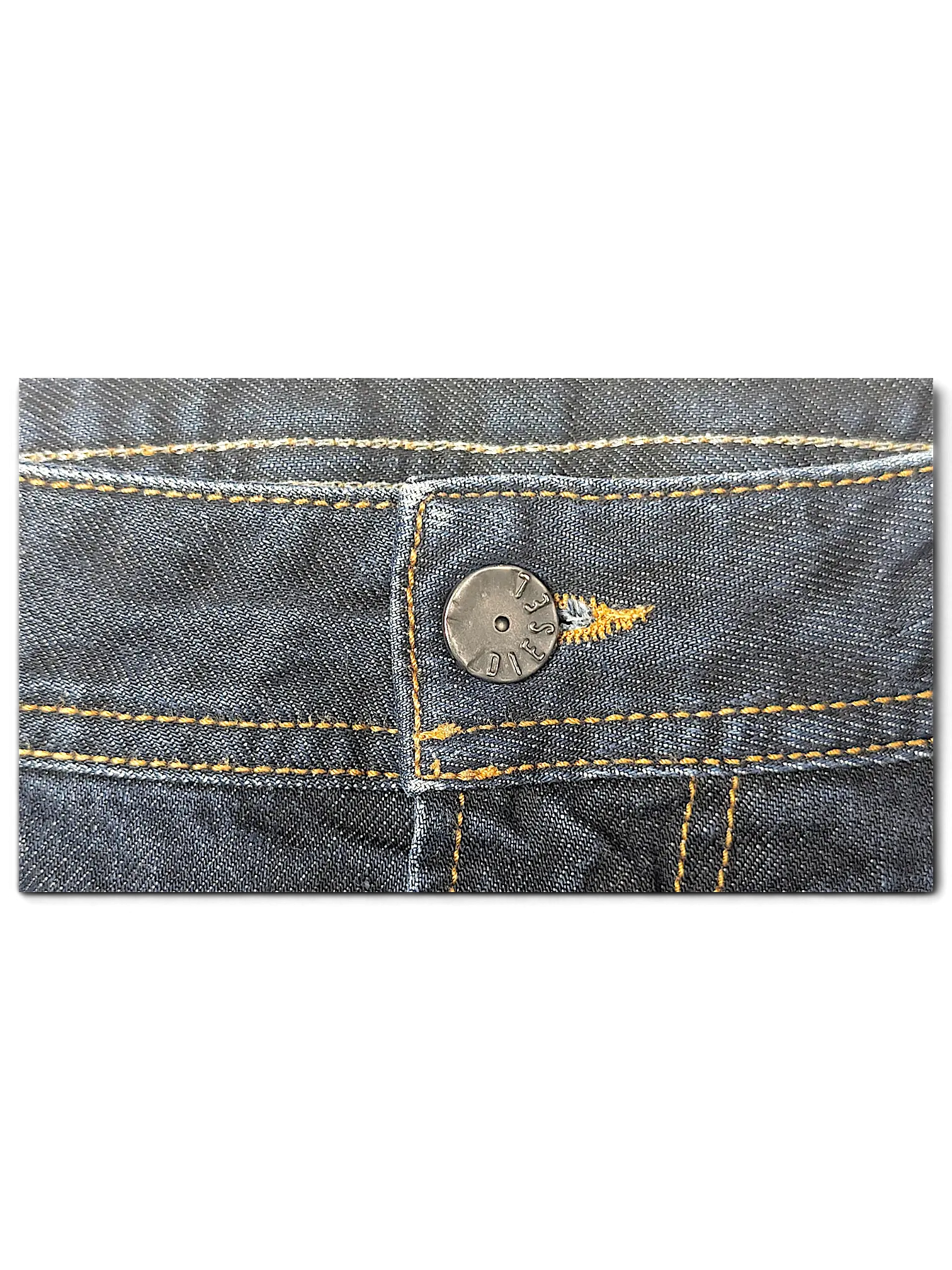 JAKE & IPI Diesel Krooley dark wash denim jeans featuring a branded metal button and contrast stitching detail.