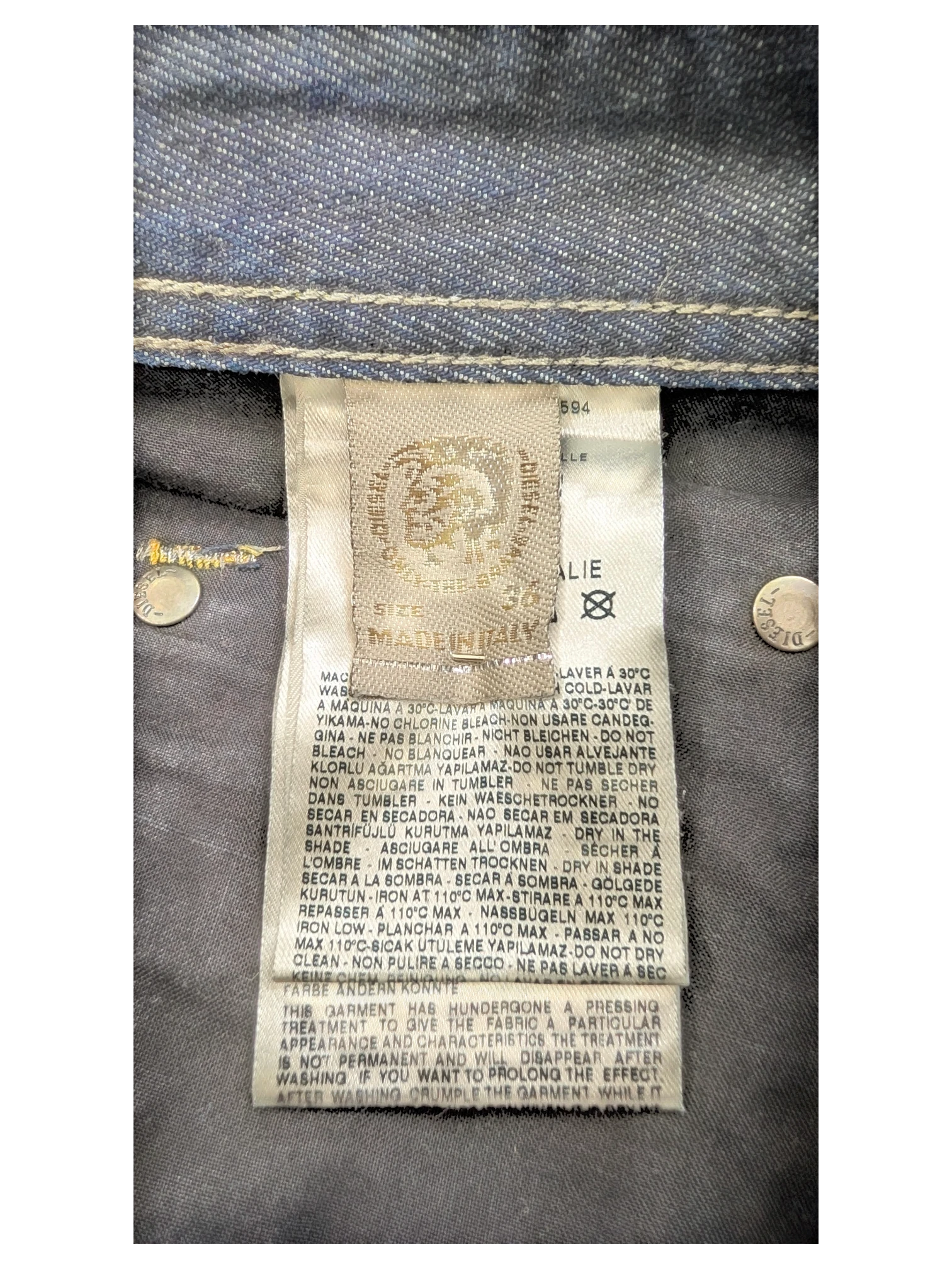 JAKE & IPI Diesel Larkee jeans, size 36, made in Italy. Dark wash denim with care instructions label.