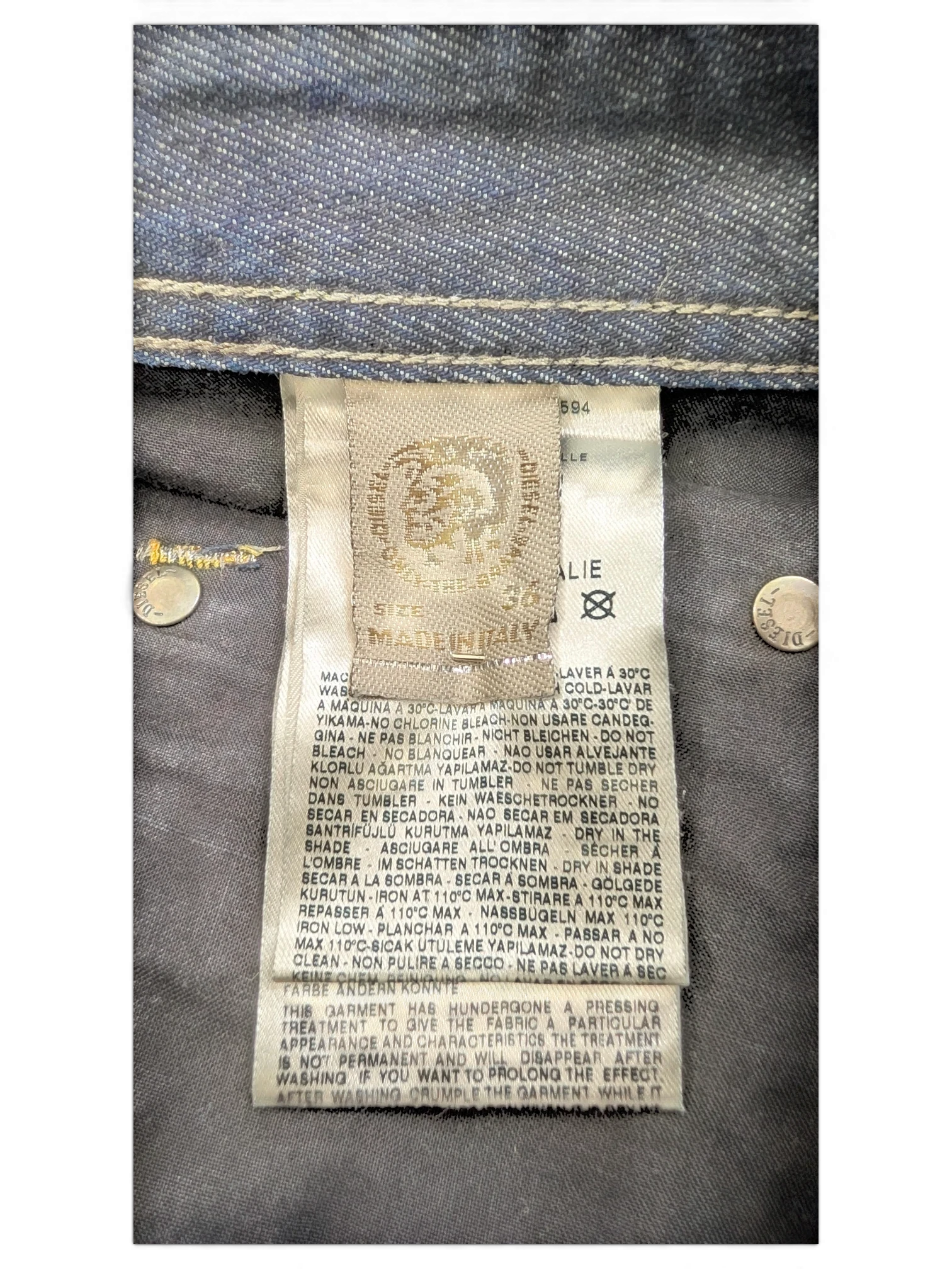 JAKE & IPI Diesel Larkee jeans, size 36, made in Italy. Dark wash denim with care instructions label.