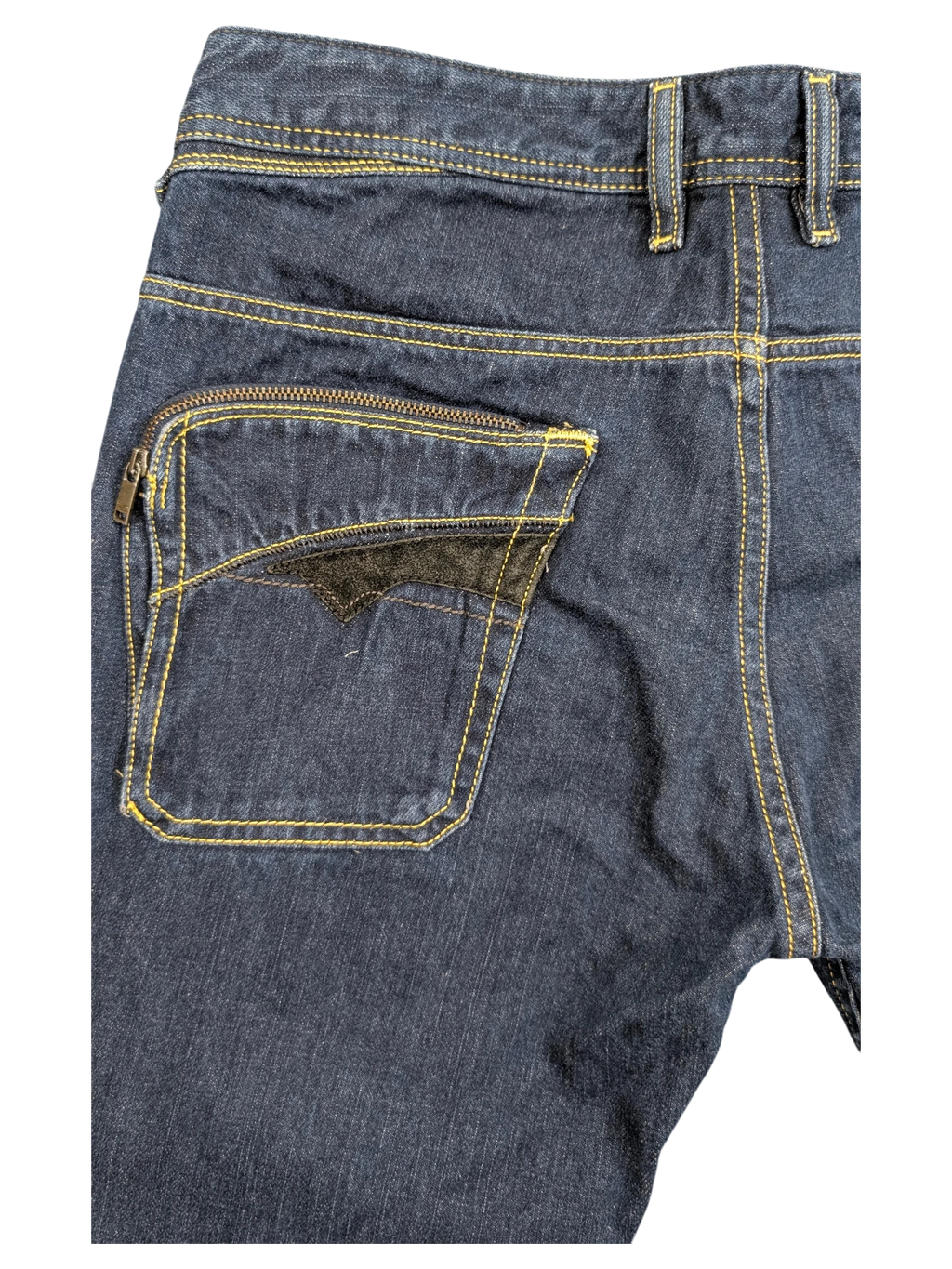 JAKE & IPI dark wash denim jeans with yellow stitching and a unique zippered back pocket featuring black velvet trim.