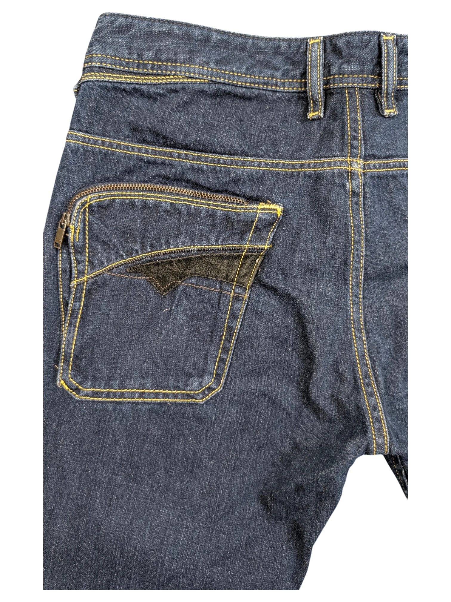 JAKE & IPI dark wash denim jeans with yellow stitching and a unique zippered back pocket featuring black velvet trim.