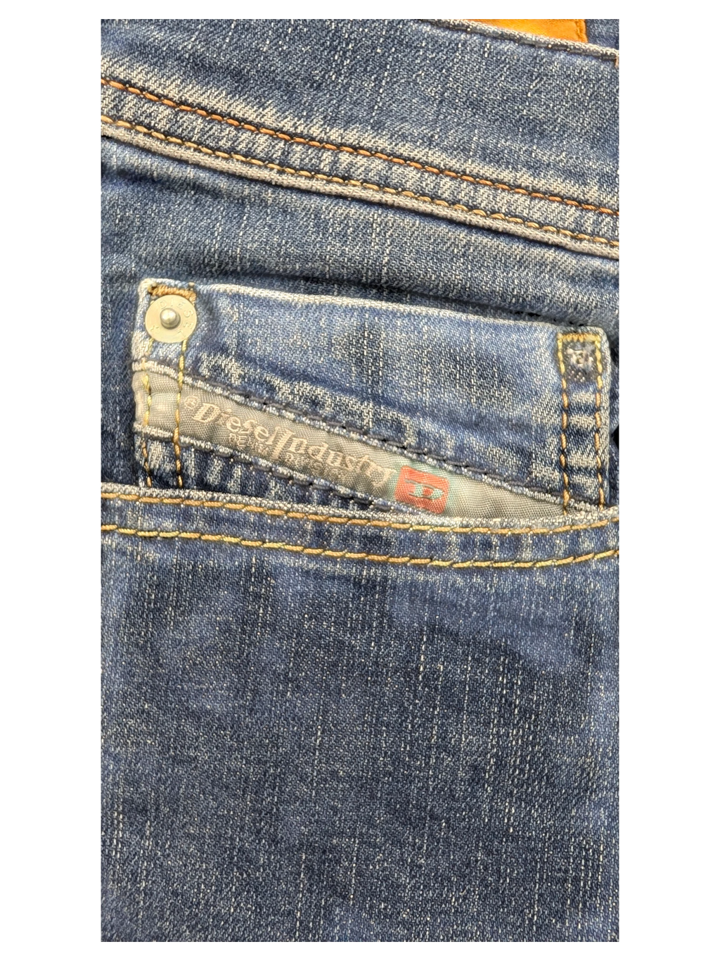 JAKE & IPI Diesel Tepphar jeans in blue denim with a small coin pocket and signature red logo tag.