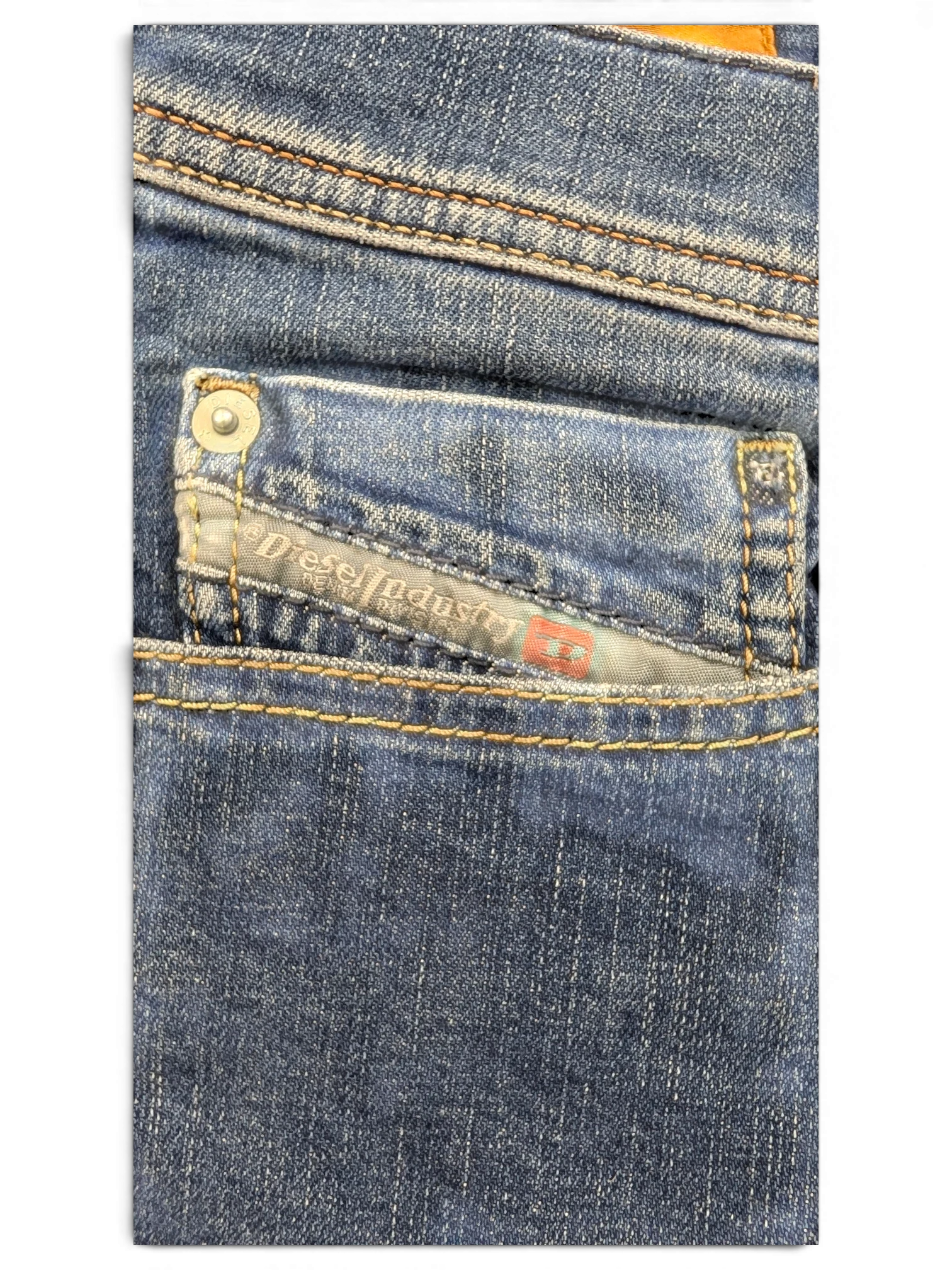 JAKE & IPI Diesel Tepphar jeans in blue denim with a small coin pocket and signature red logo tag.