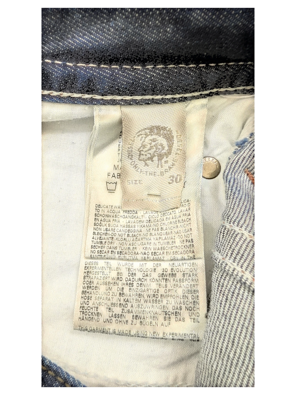 JAKE & IPI Diesel Thavar jeans, size 30, dark wash denim with contrast stitching and branded tag.