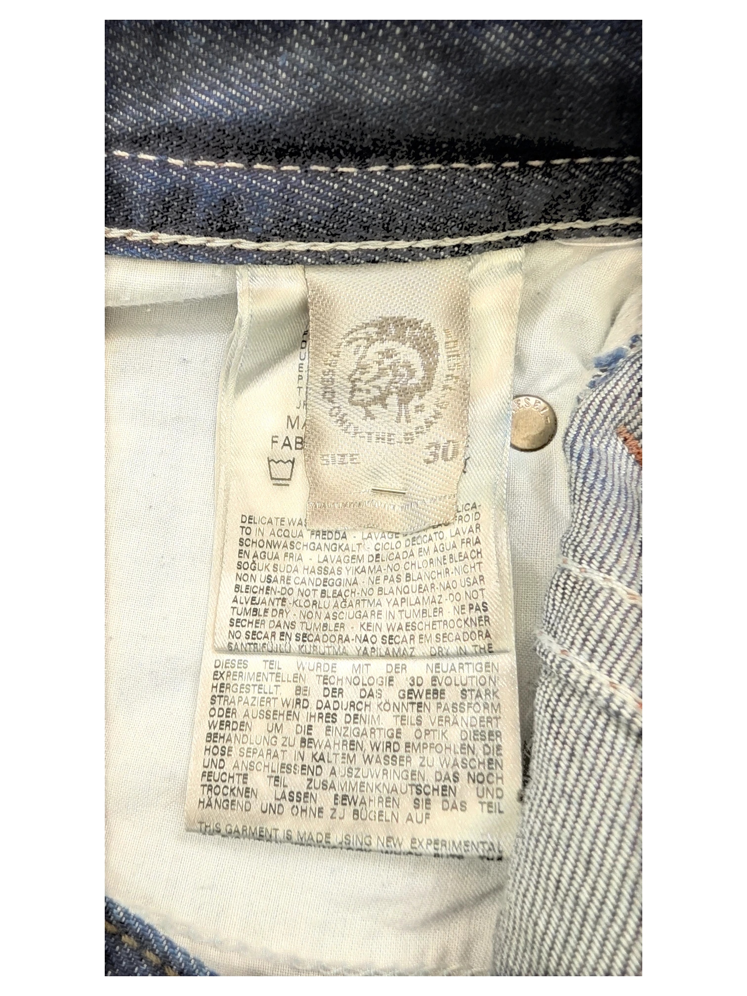 JAKE & IPI Diesel Thavar jeans, size 30, dark wash denim with contrast stitching and branded tag.