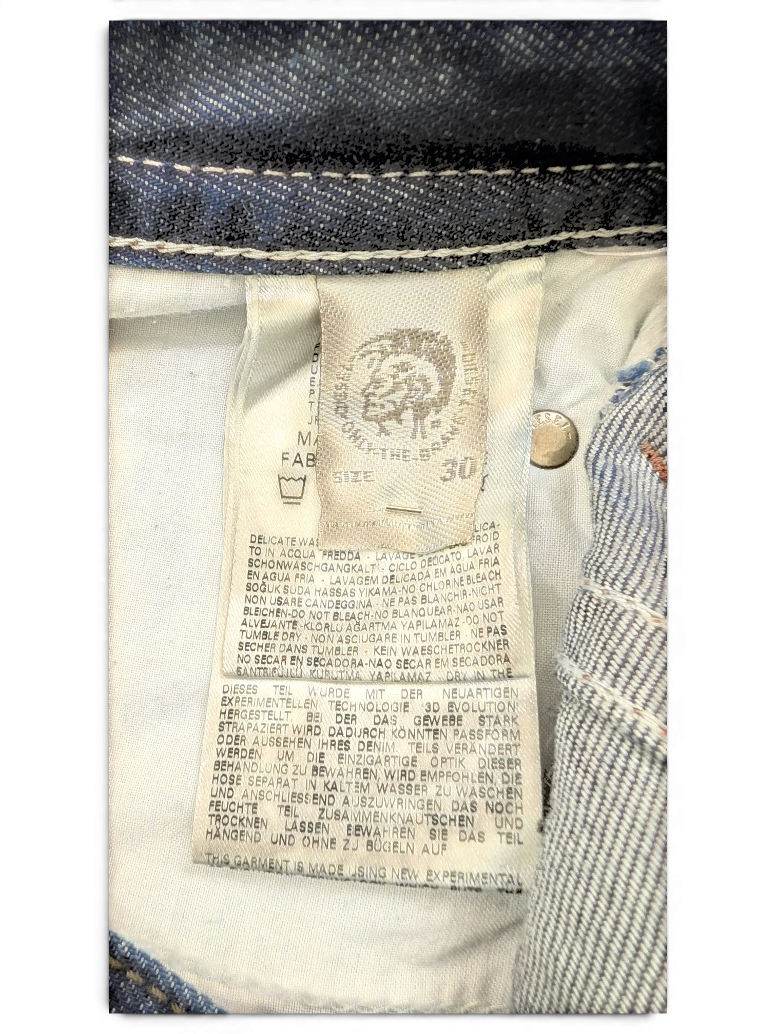JAKE & IPI Diesel Thavar jeans, size 30, dark wash denim with contrast stitching and branded tag.