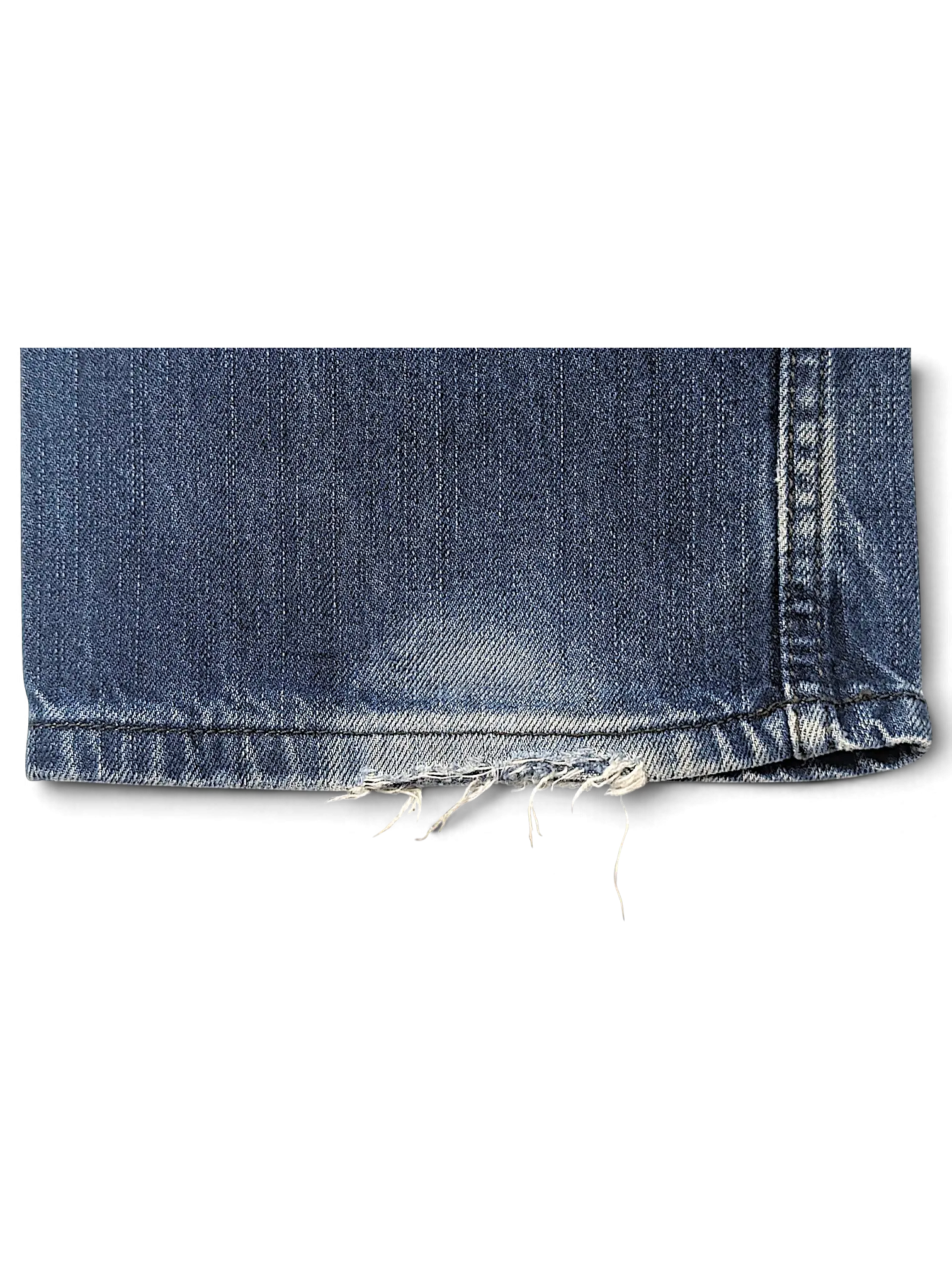 JAKE & IPI Diesel Vikerback blue denim jeans hem detail showing distressed frayed edges and faded wash