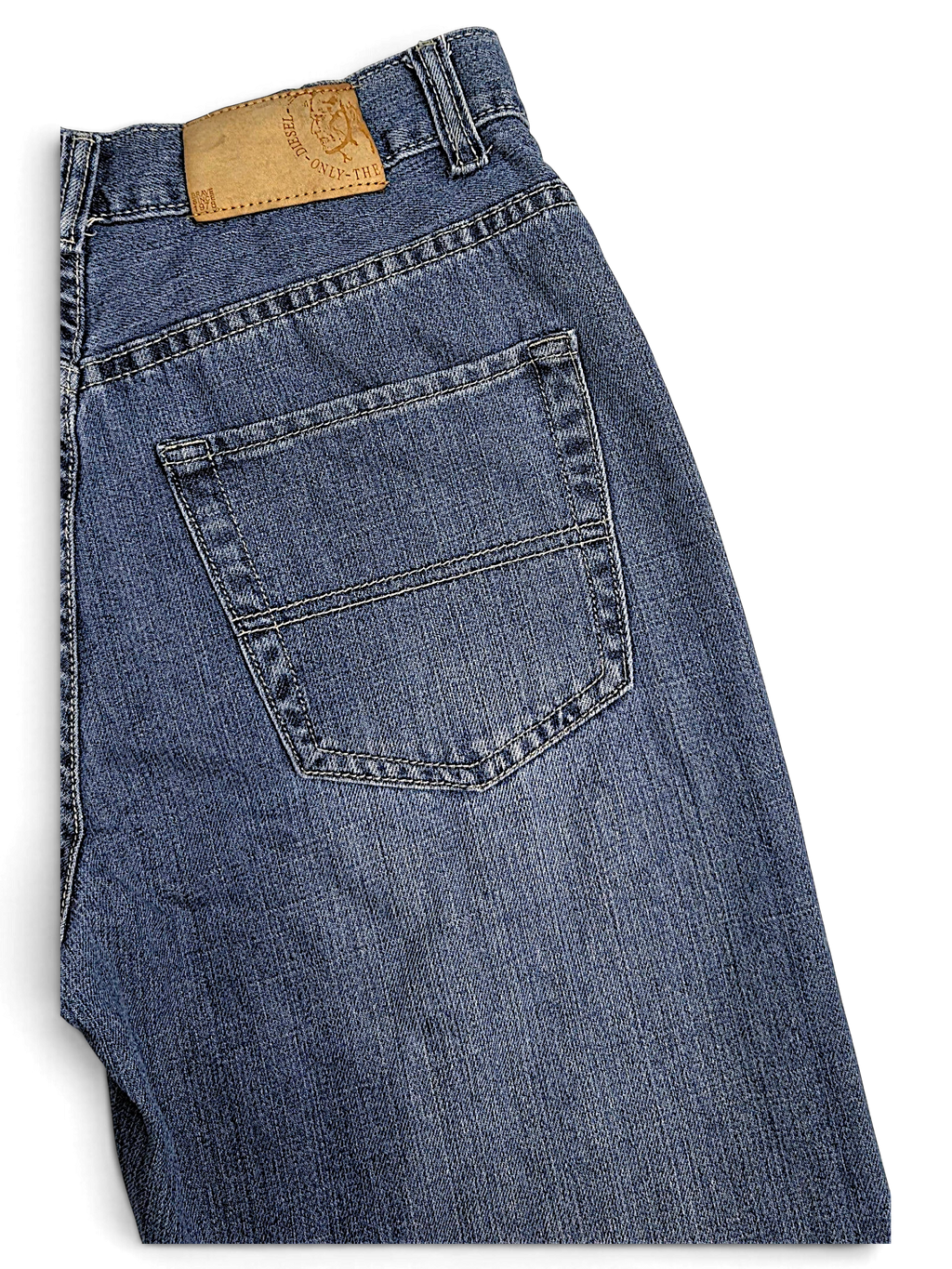 JAKE & IPI vintage Diesel blue denim jeans featuring a leather brand patch and classic back pocket detail.