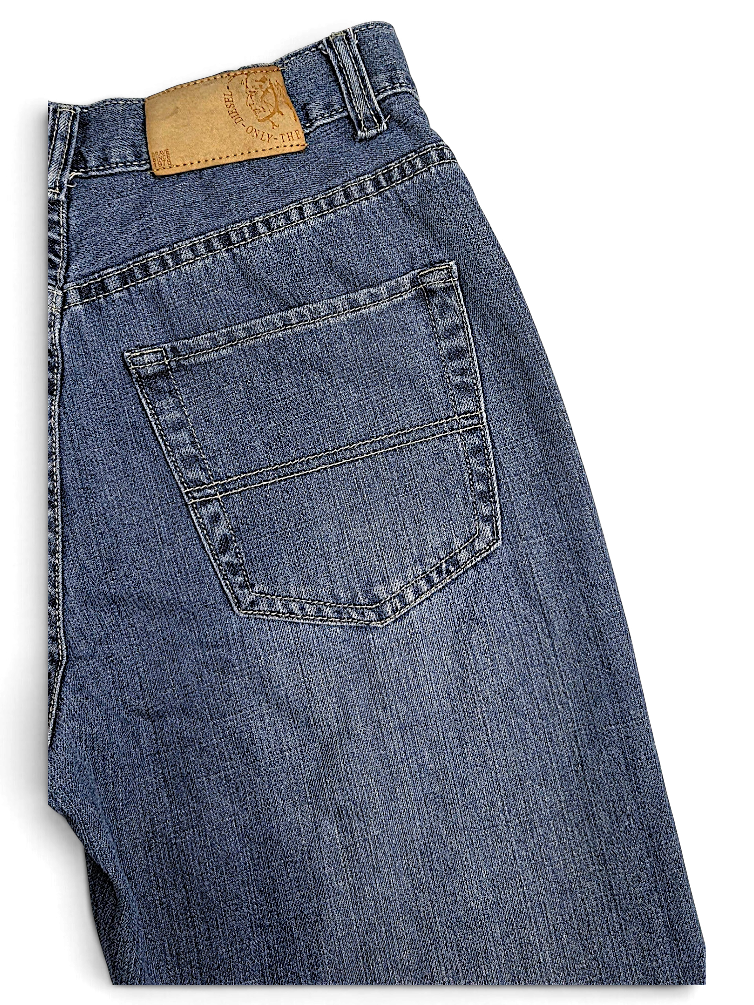 JAKE & IPI vintage Diesel blue denim jeans featuring a leather brand patch and classic back pocket detail.
