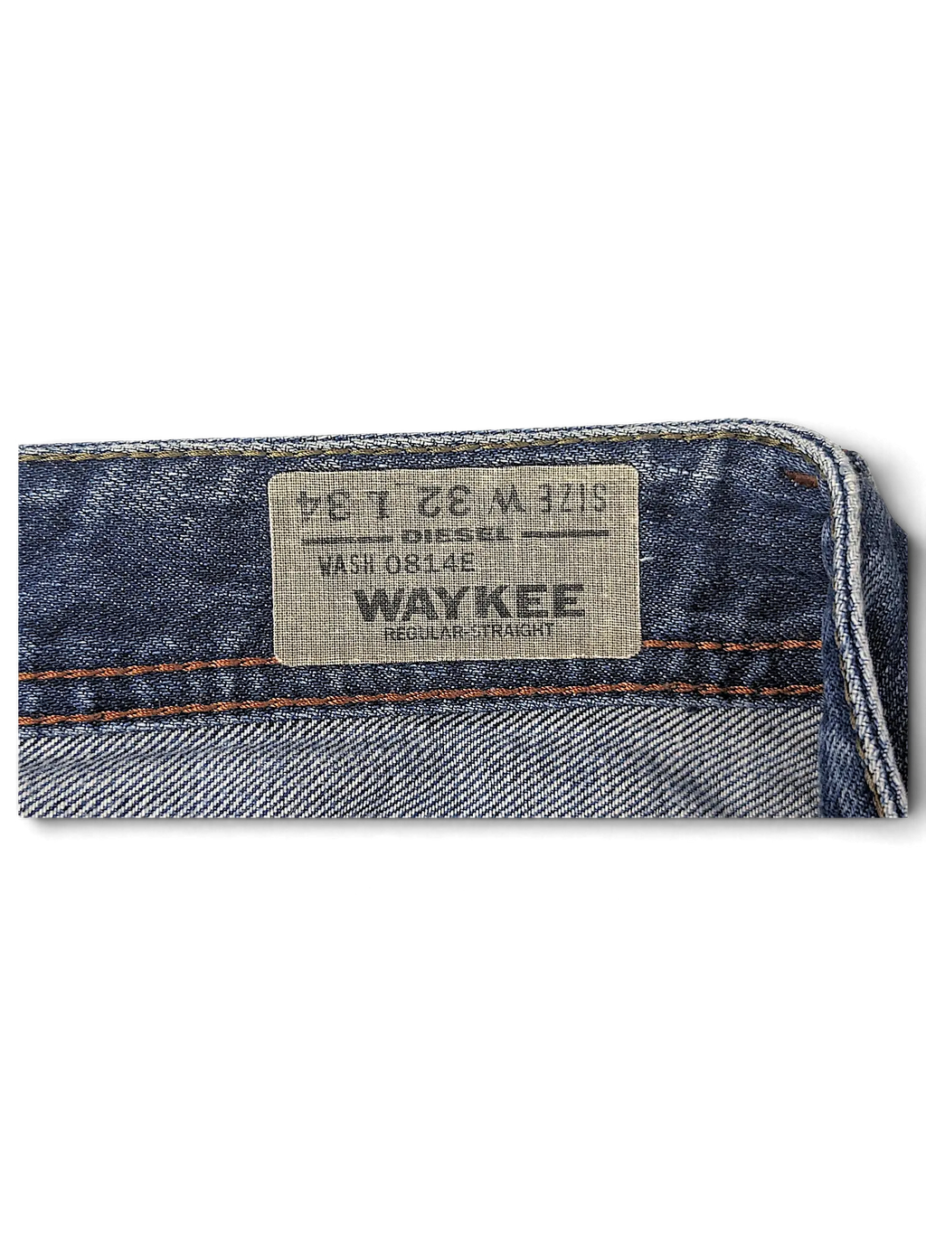 JAKE & IPI Diesel Waykee jeans interior label showing size W32 L34 and wash 0814E details on blue denim fabric