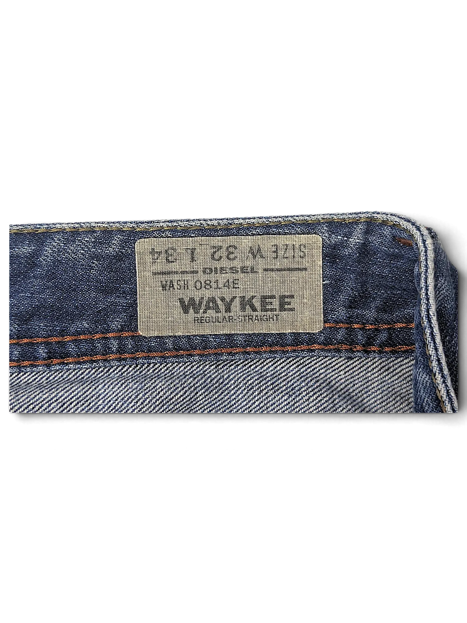 JAKE & IPI Diesel Waykee jeans interior label showing size W32 L34 and wash 0814E details on blue denim fabric