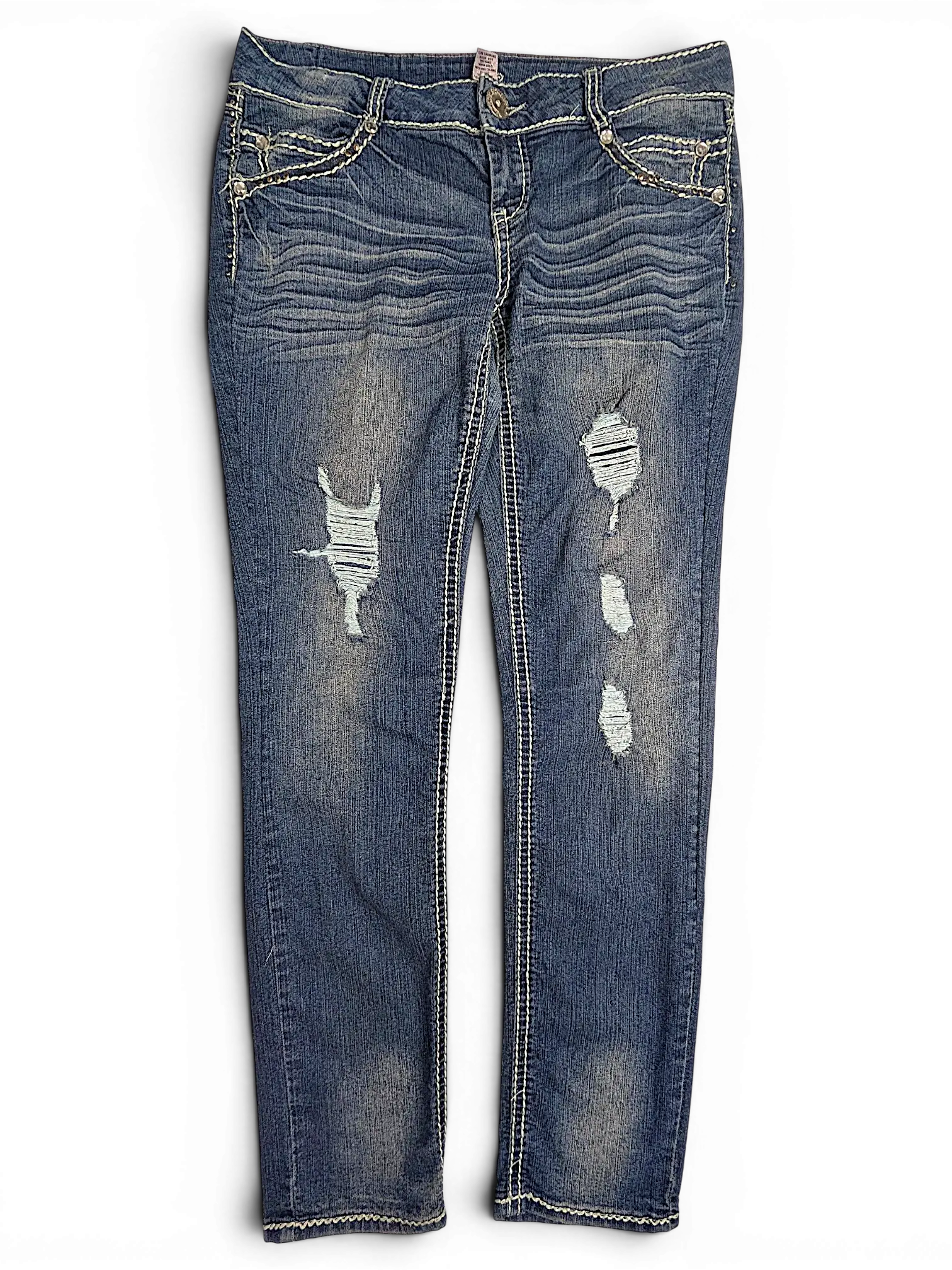 JAKE & IPI Almost Famous distressed blue denim jeans with whiskering, contrast stitching, and ripped knee details.