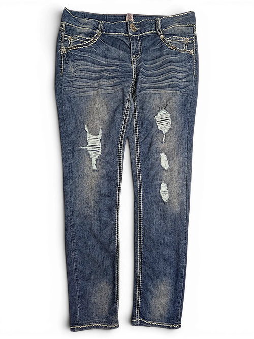 JAKE & IPI Almost Famous distressed blue denim jeans with whiskering, contrast stitching, and ripped knee details.