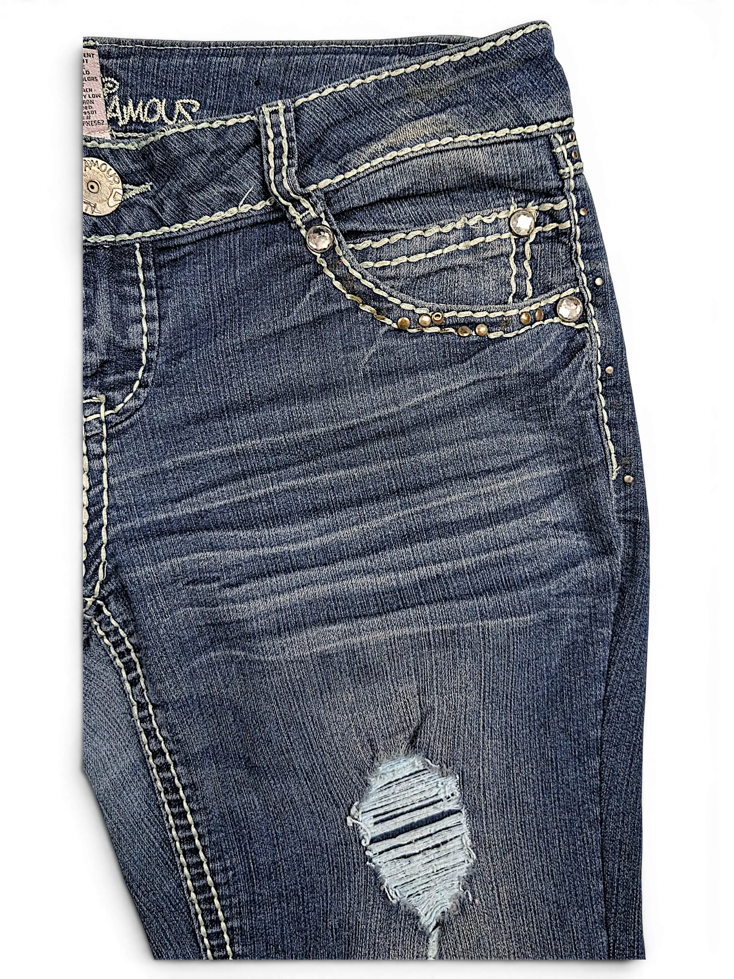 JAKE & IPI Almost Famous distressed blue denim jeans with white contrast stitching and rhinestone pocket detailing.