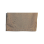 JAKE & IPI Dockers beige cotton chino leg detail showing fabric texture and a small dark stain near the hem