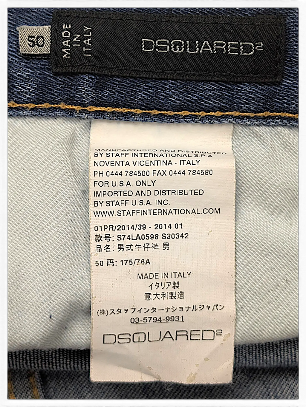 JAKE & IPI Dsquared2 jeans interior label showing size 50, made in Italy, and manufacturing details.