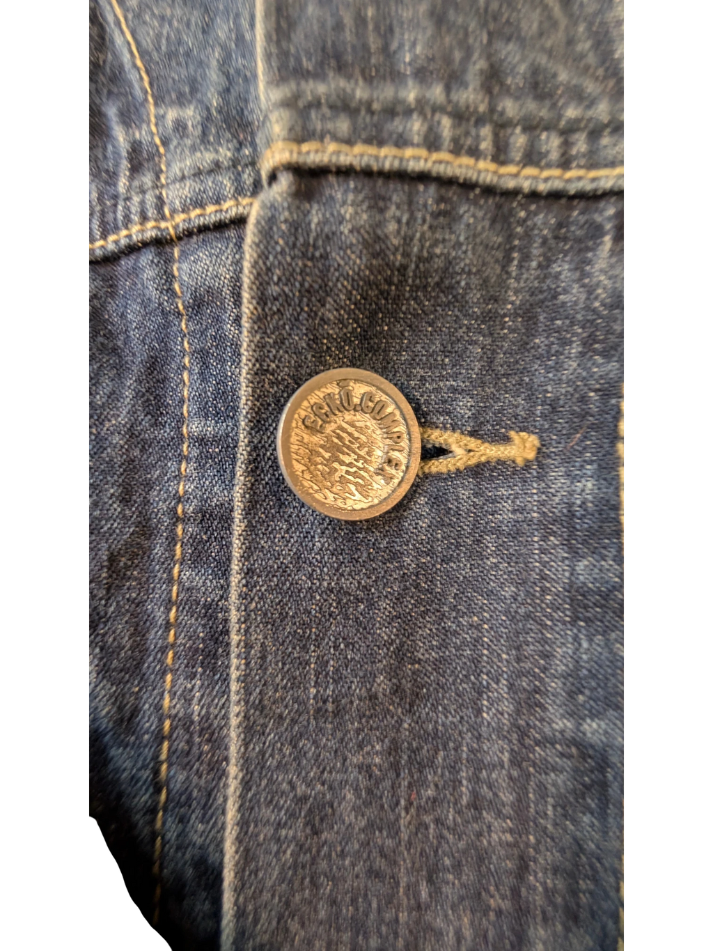 JAKE & IPI Ecko denim jacket with a metal button closure and tan stitching.