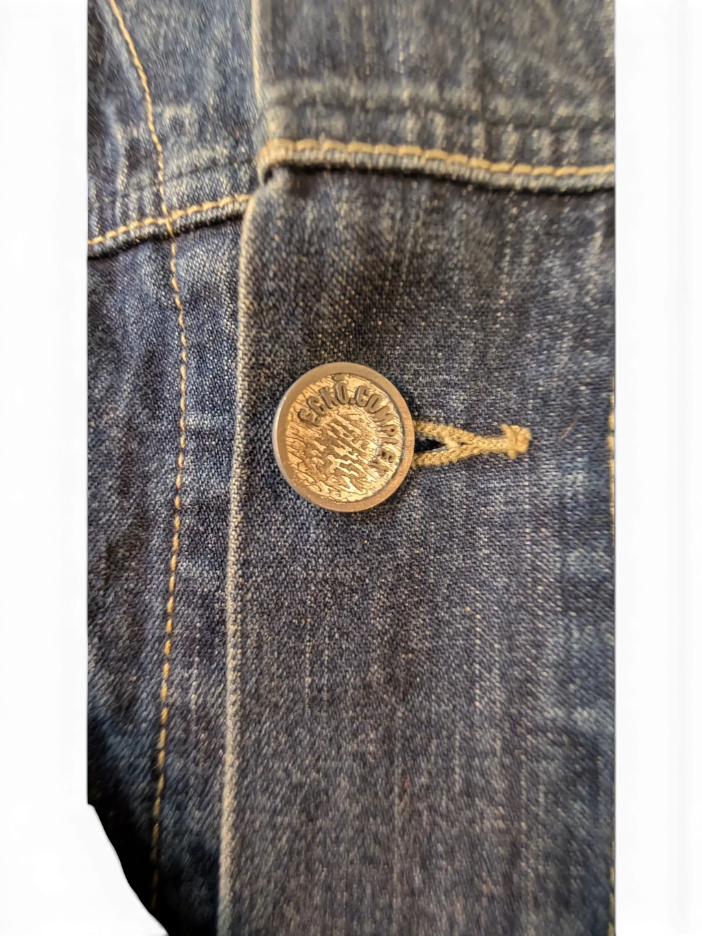 JAKE & IPI Ecko denim jacket with a metal button closure and tan stitching.