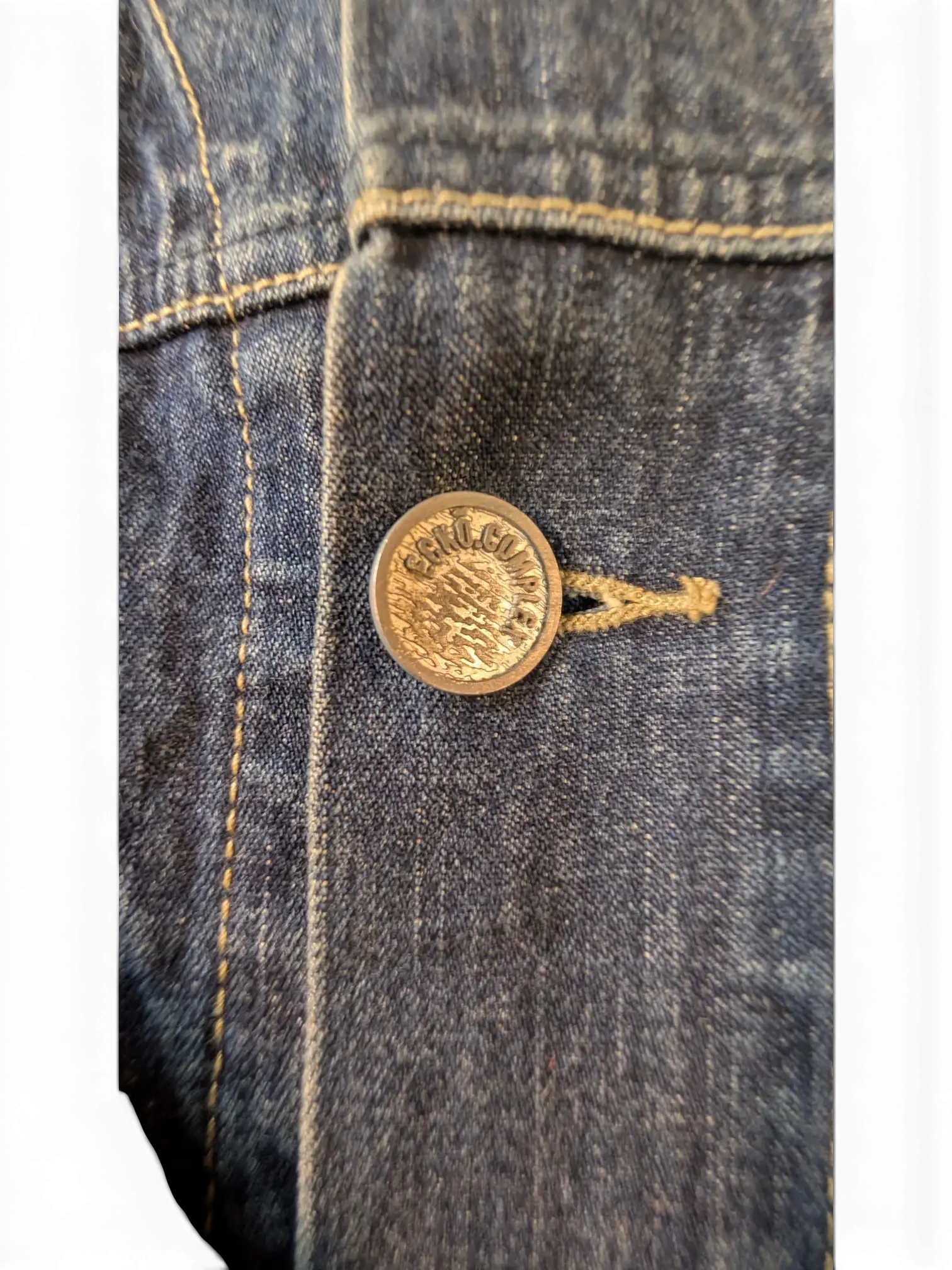 JAKE & IPI Ecko denim jacket with a metal button closure and tan stitching.