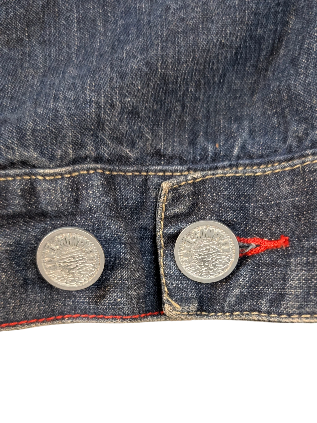 JAKE & IPI Ecko denim jacket with silver buttons and red stitching detail.