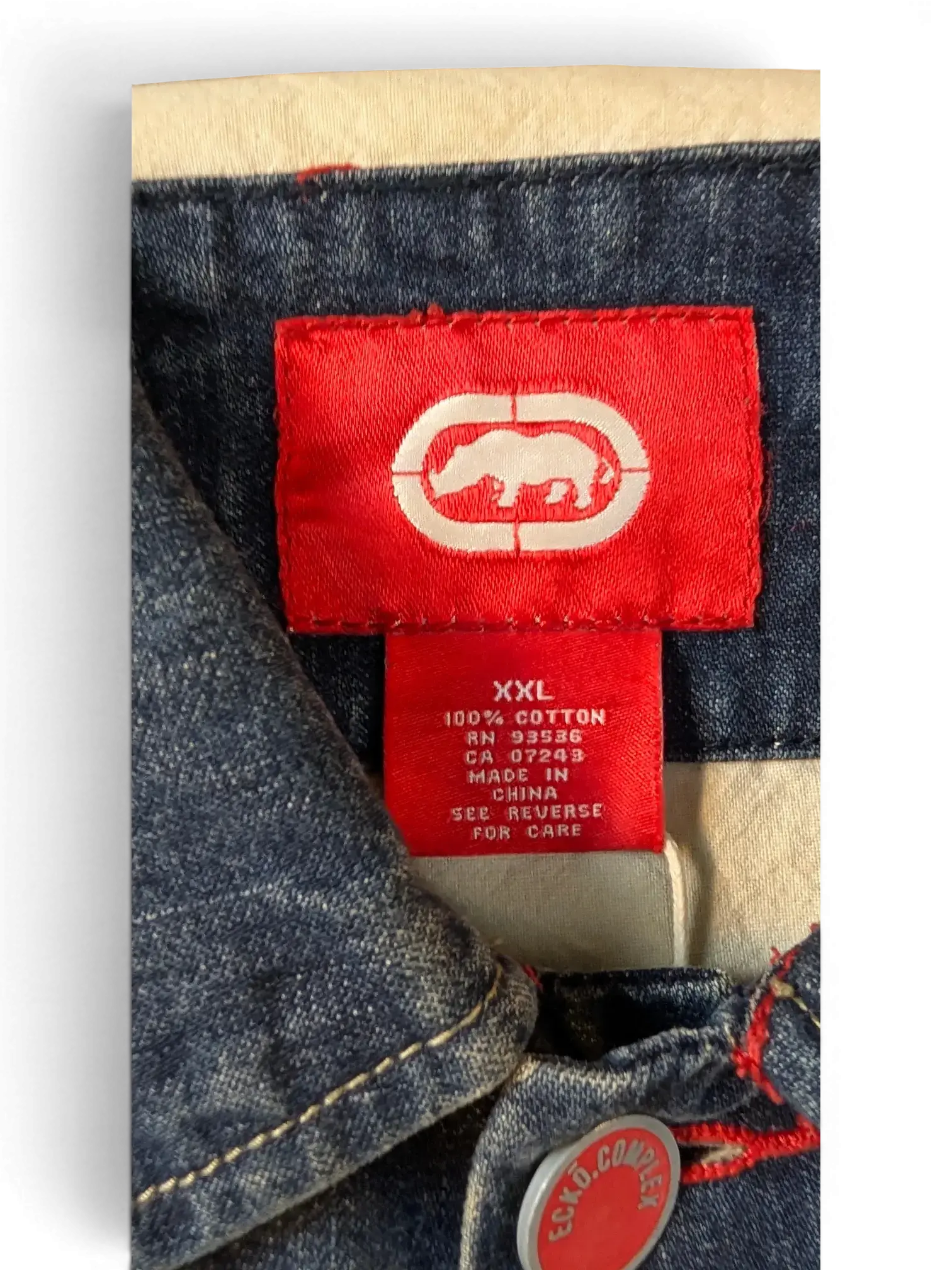 JAKE & IPI Ecko denim jacket with red Ecko logo tag and XXL size label. 100% cotton.