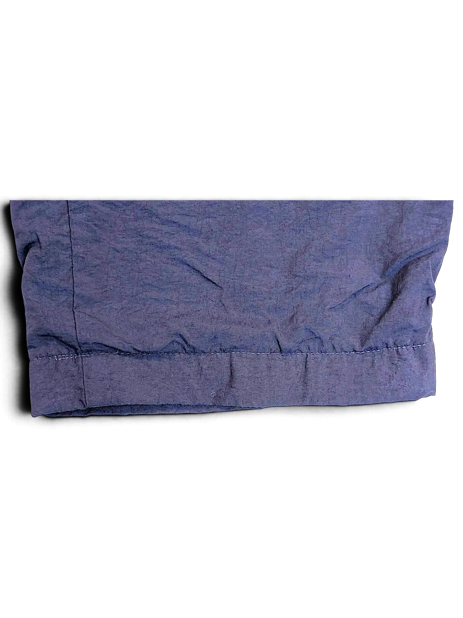JAKE & IPI pre-owned Fila dark navy track pants hem detail showing stitching and fabric texture