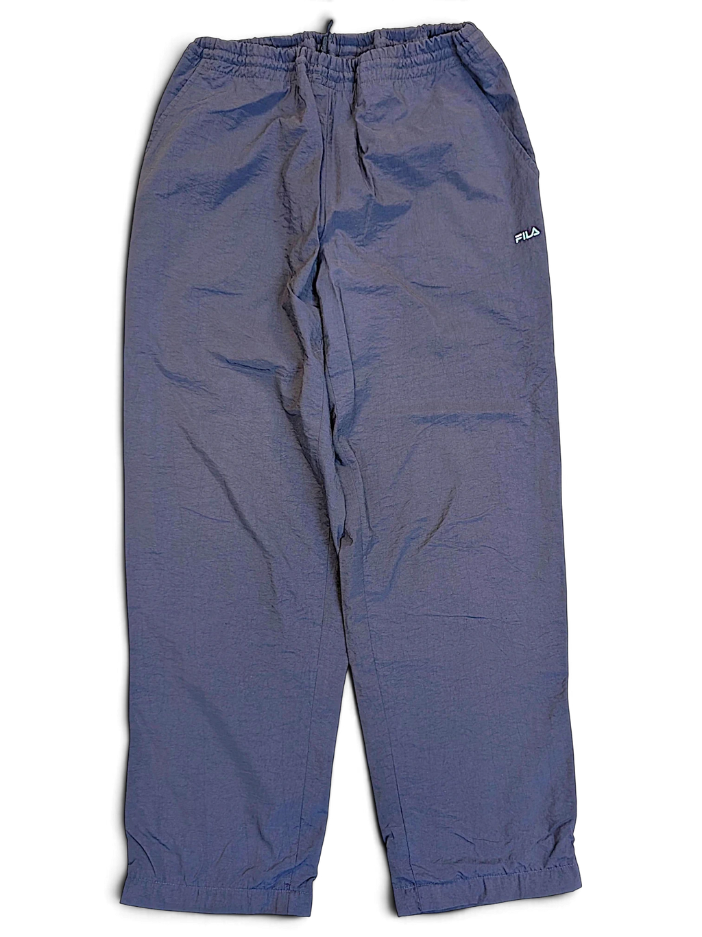 JAKE & IPI pre-owned Fila dark navy track pants with an elasticated waistband and small logo detail