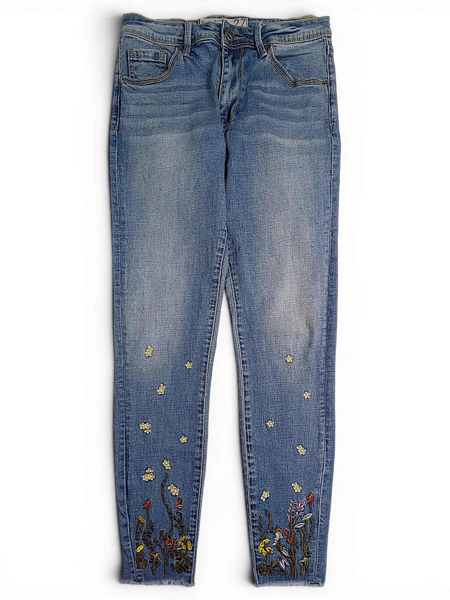 JAKE & IPI Amisu skinny jeans in light blue denim with floral embroidery at the ankles and raw hem