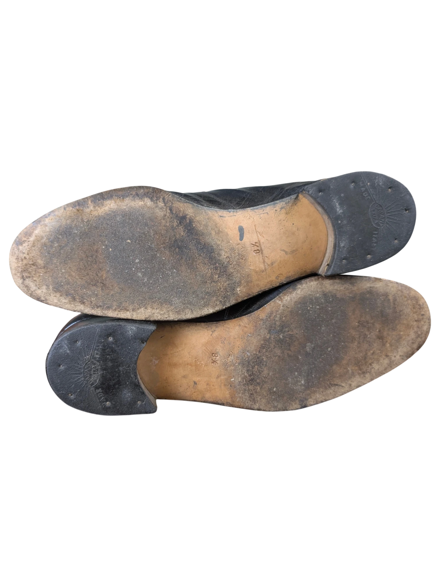 JAKE & IPI Fratelli Rossetti estate black leather loafers showing worn leather outsoles and stacked heels