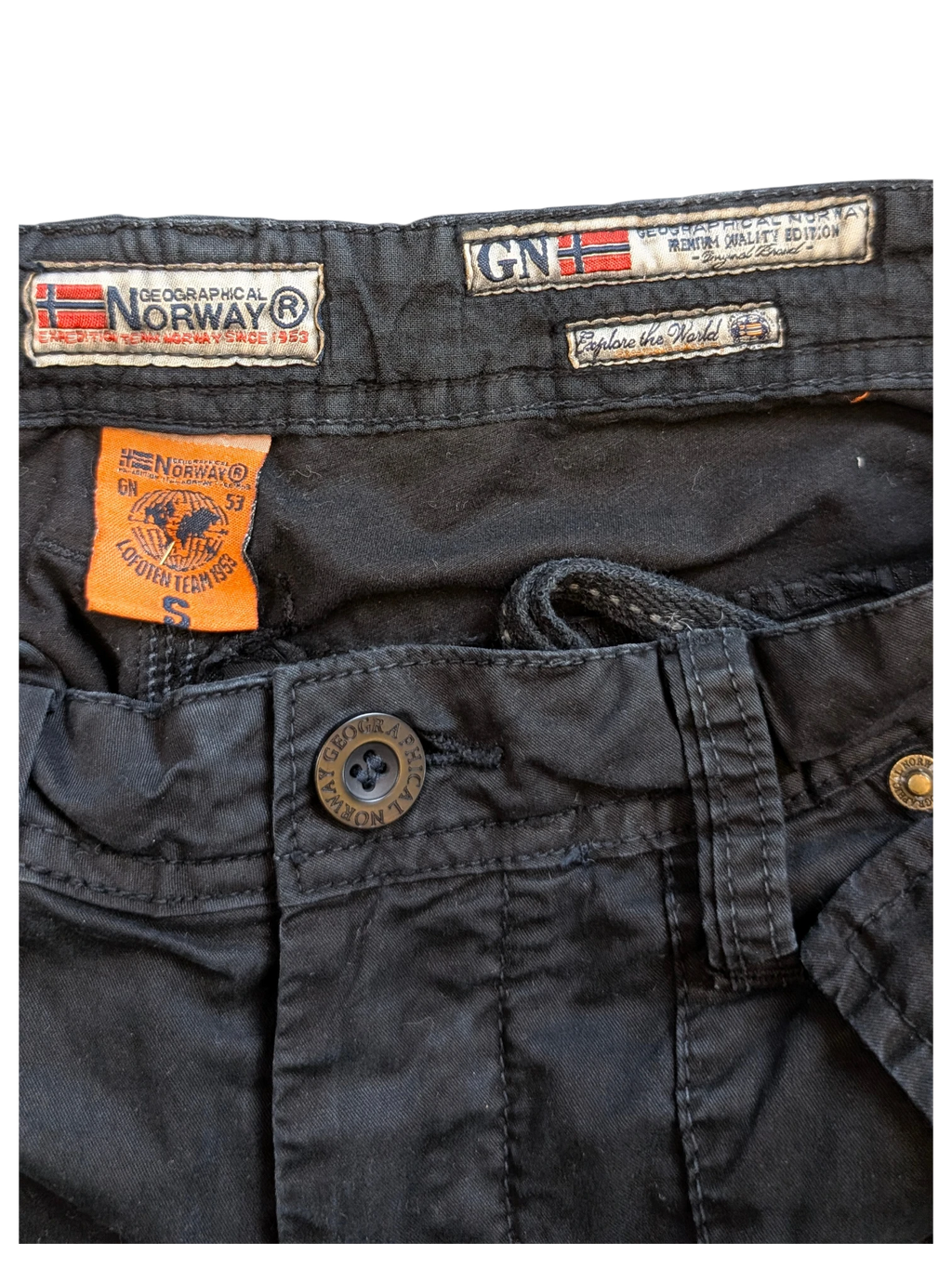 JAKE & IPI Geographical Norway black cargo pants, size S, with multiple tags and button closure.