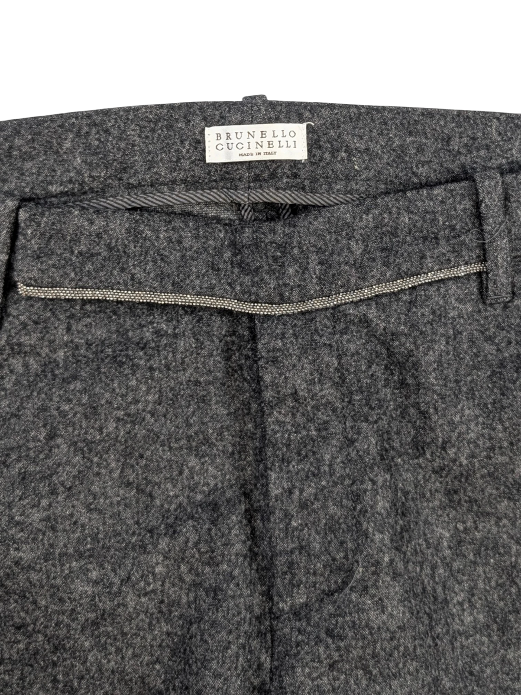 JAKE & IPI grey mélange wool blend flannel tailored trousers with subtle taper and horn-style buttons.