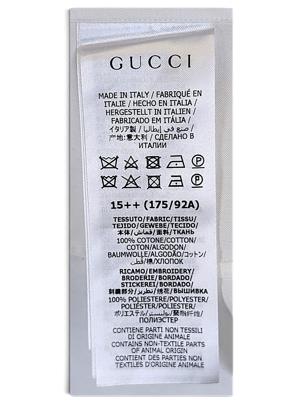 JAKE & IPI Gucci shirt white fabric care label with multilingual text and washing instructions