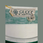 JAKE & IPI Vintage 70s/80s Gucci green and white striped cotton t-shirt with GG emblem and rope detail. Size L.