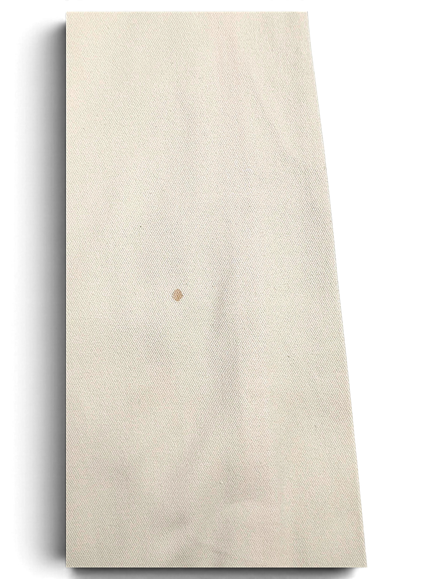 JAKE & IPI Indian Rose white cotton cargo pant fabric showing a small brown stain on the textured material