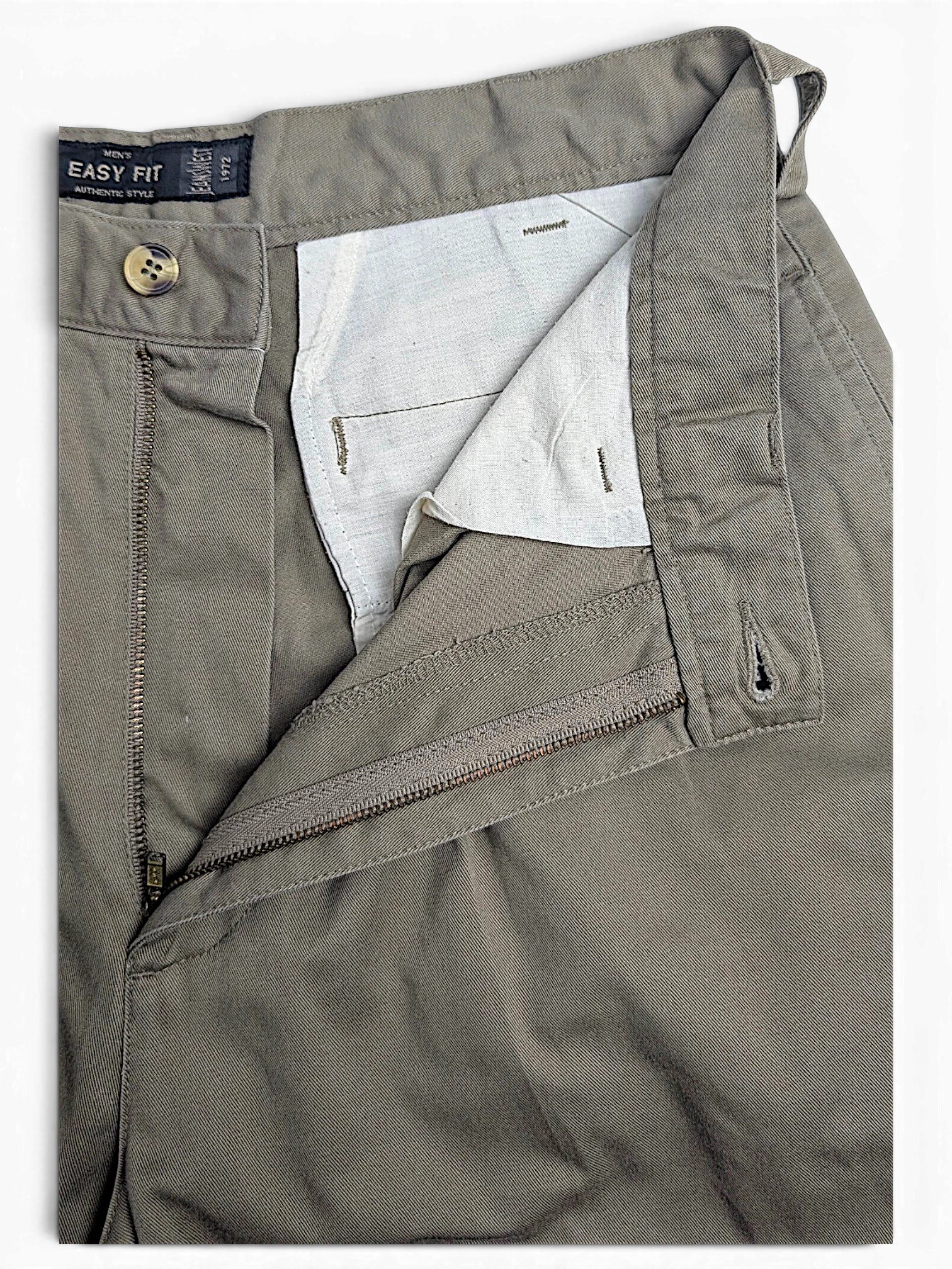 JAKE & IPI Jeanswest light grey taupe cotton pleated trousers with a relaxed easy fit and button fly detail.