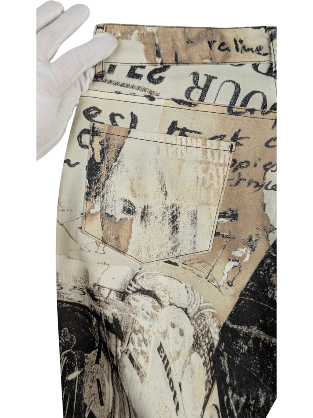 JAKE & IPI Just Cavalli newspaper print slim-fit jeans in sepia, cream, and black. Features mid-rise waist and 5-pocket design.