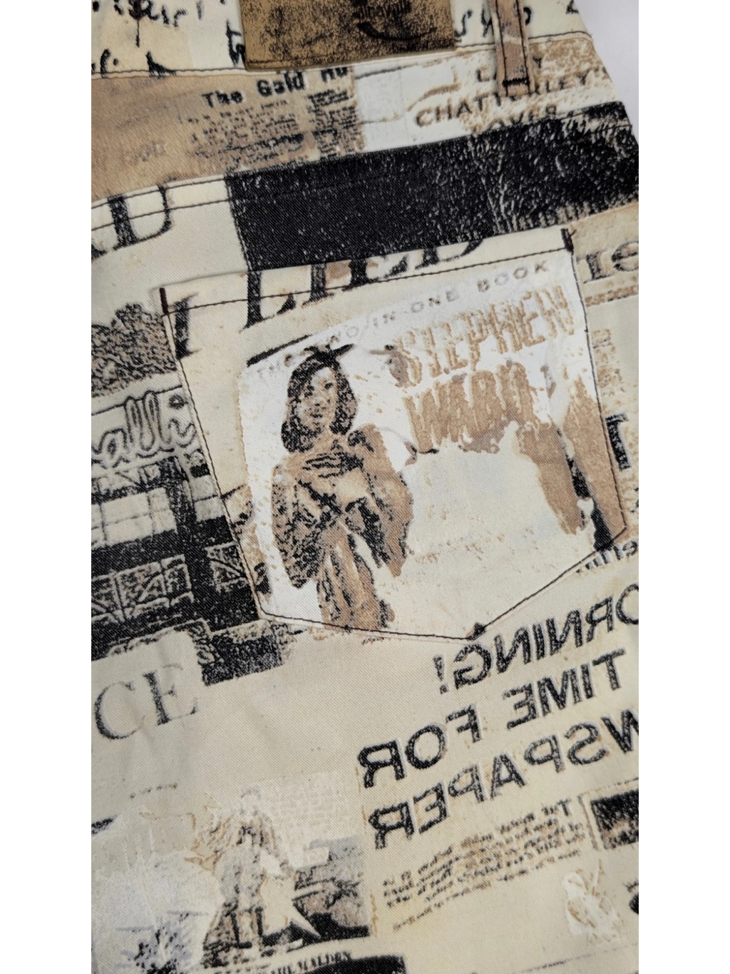 JAKE & IPI Just Cavalli newspaper print jeans in sepia, cream, and black. Slim fit, mid-rise, 5-pocket design. Y2K era.