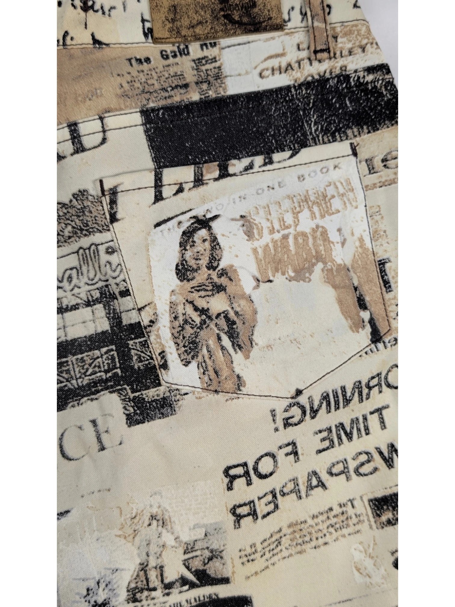 JAKE & IPI Just Cavalli newspaper print jeans in sepia, cream, and black. Slim fit, mid-rise, 5-pocket design. Y2K era.