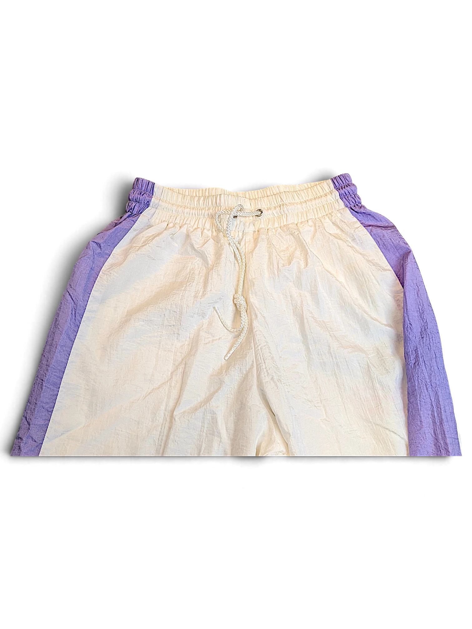 JAKE & IPI Kappa retro track pants in white and lilac with a drawstring waist and colour-blocked side panels.