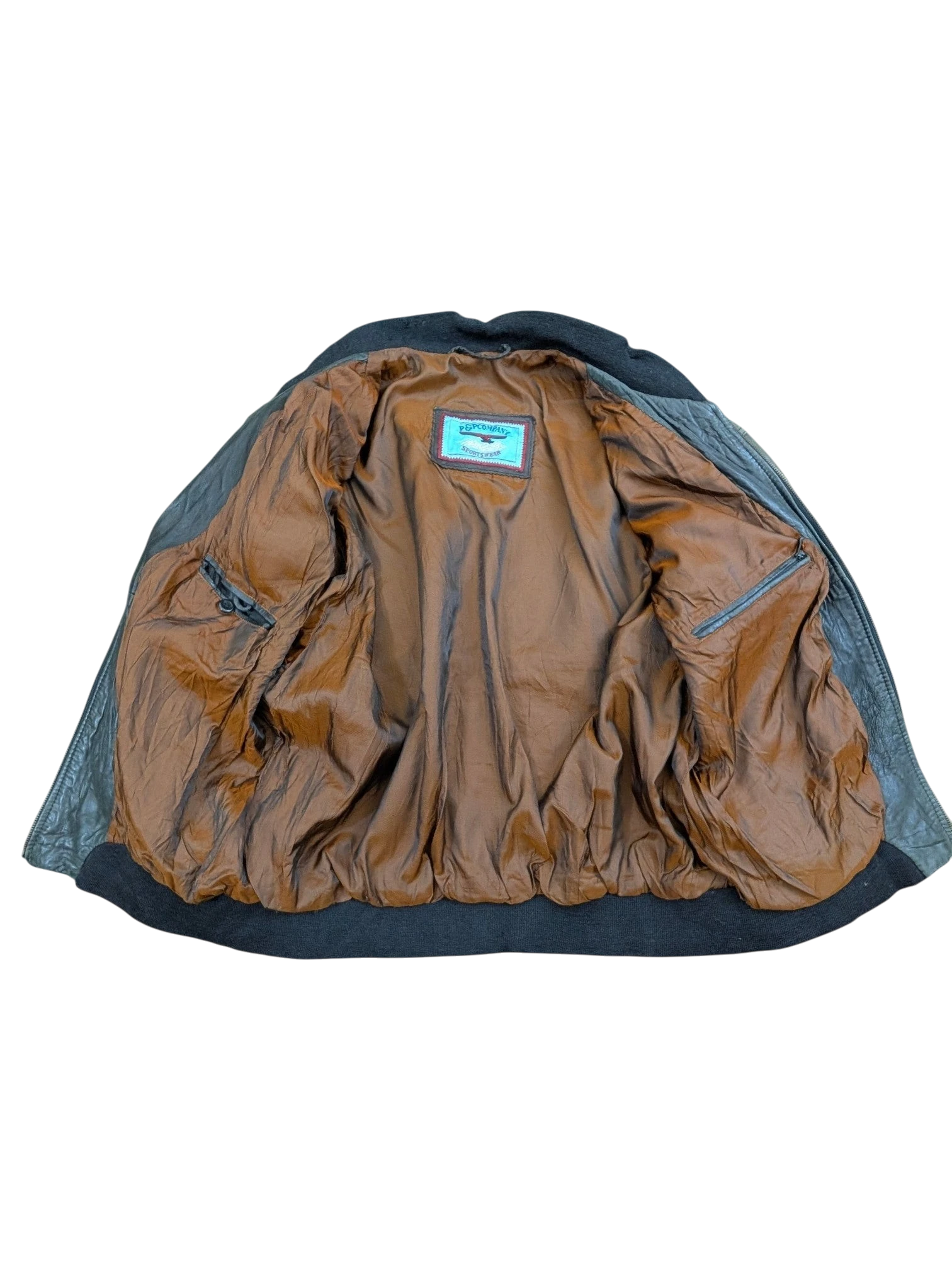 JAKE & IPI black leather sportswear jacket with brown satin lining and ribbed cuffs.