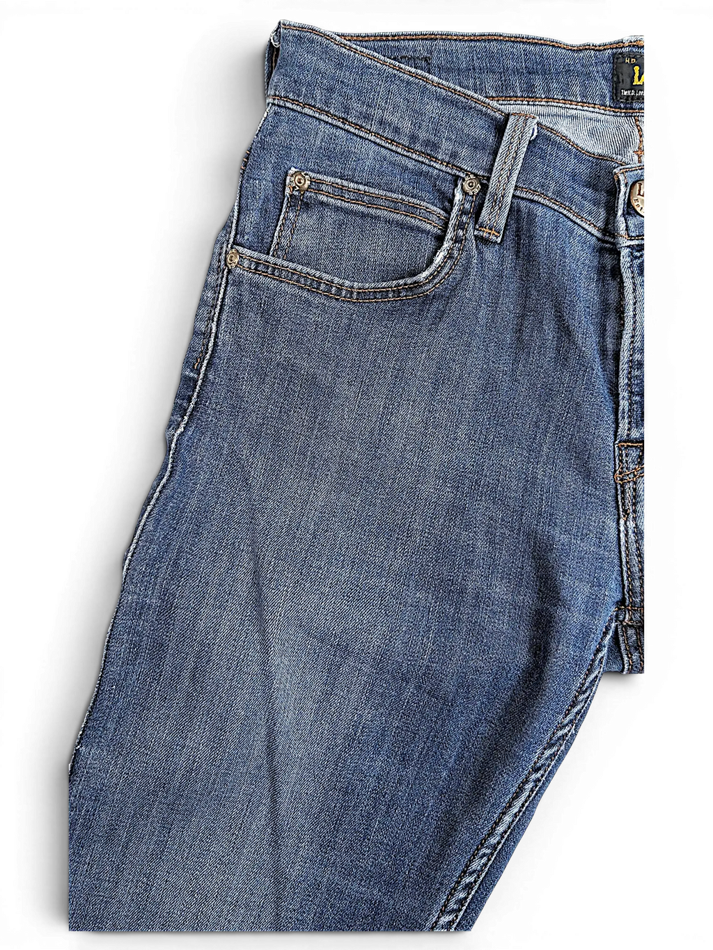 JAKE & IPI Lee Jade blue denim jeans featuring a classic five-pocket design and contrast stitching.
