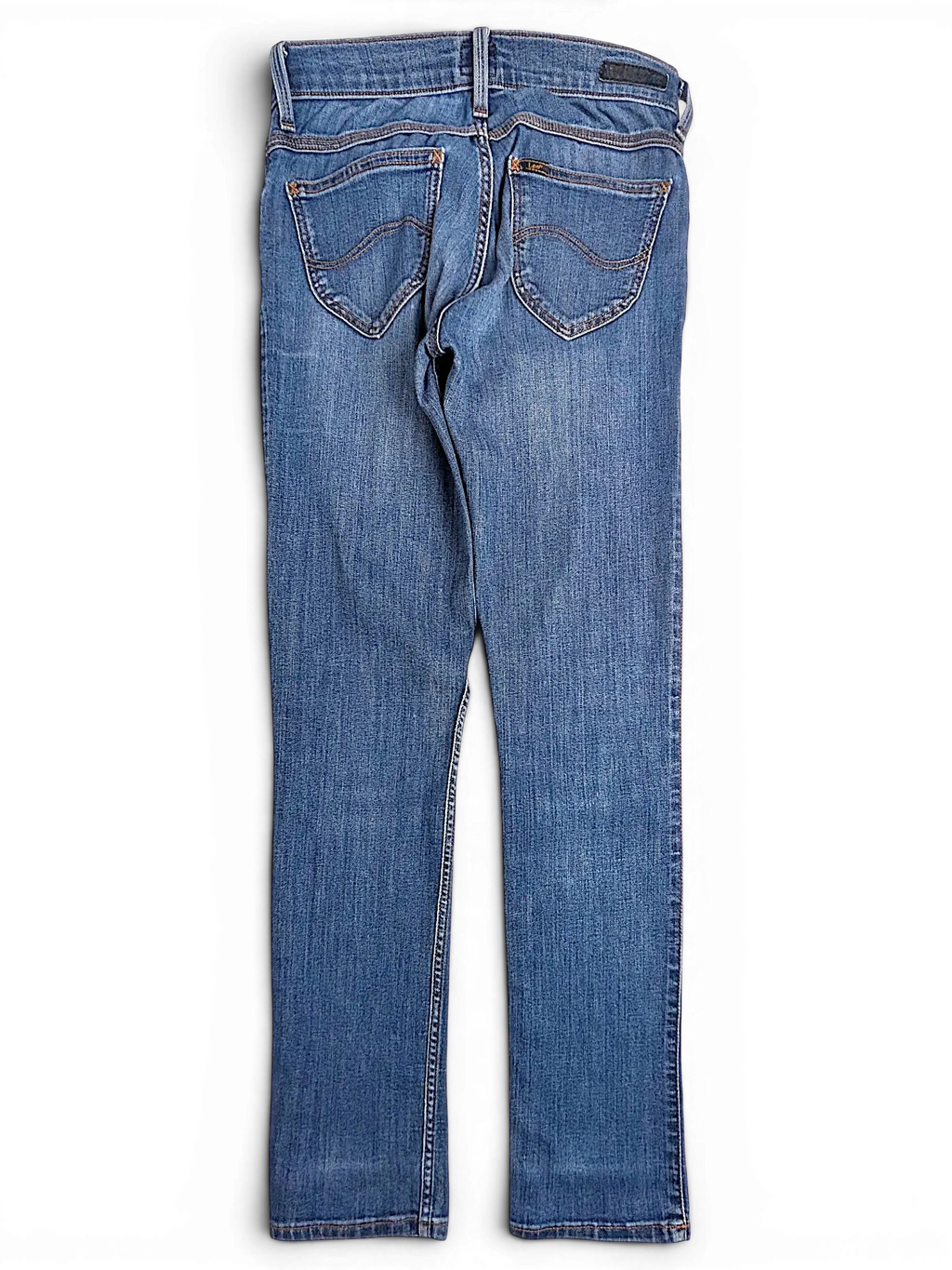 JAKE & IPI Lee Jade blue denim jeans, back view showing pockets and stitching details on a black background.
