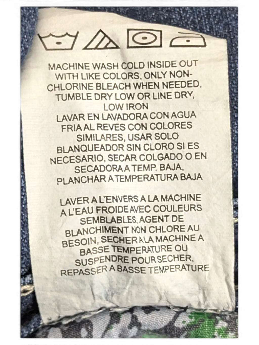 JAKE & IPI Lee Slender Secret 14 M jeans care label with washing instructions in English, Spanish, and French.