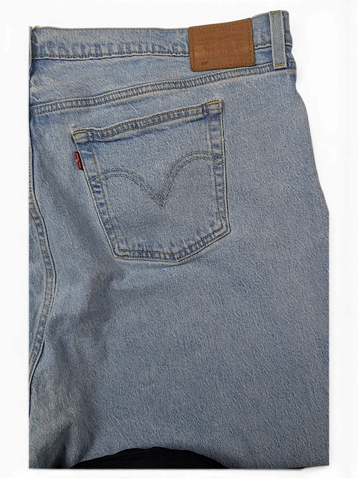 JAKE & IPI Levi's 501 20W light wash denim jeans featuring a classic five-pocket design and leather back patch.