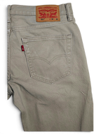 JAKE & IPI pre-owned Levi’s 511 slim fit beige stretch denim jeans with classic back pocket and leather patch