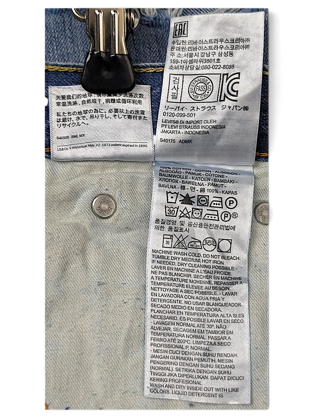 JAKE & IPI Levi's 511 ripped jeans interior care label with washing instructions and fabric composition details