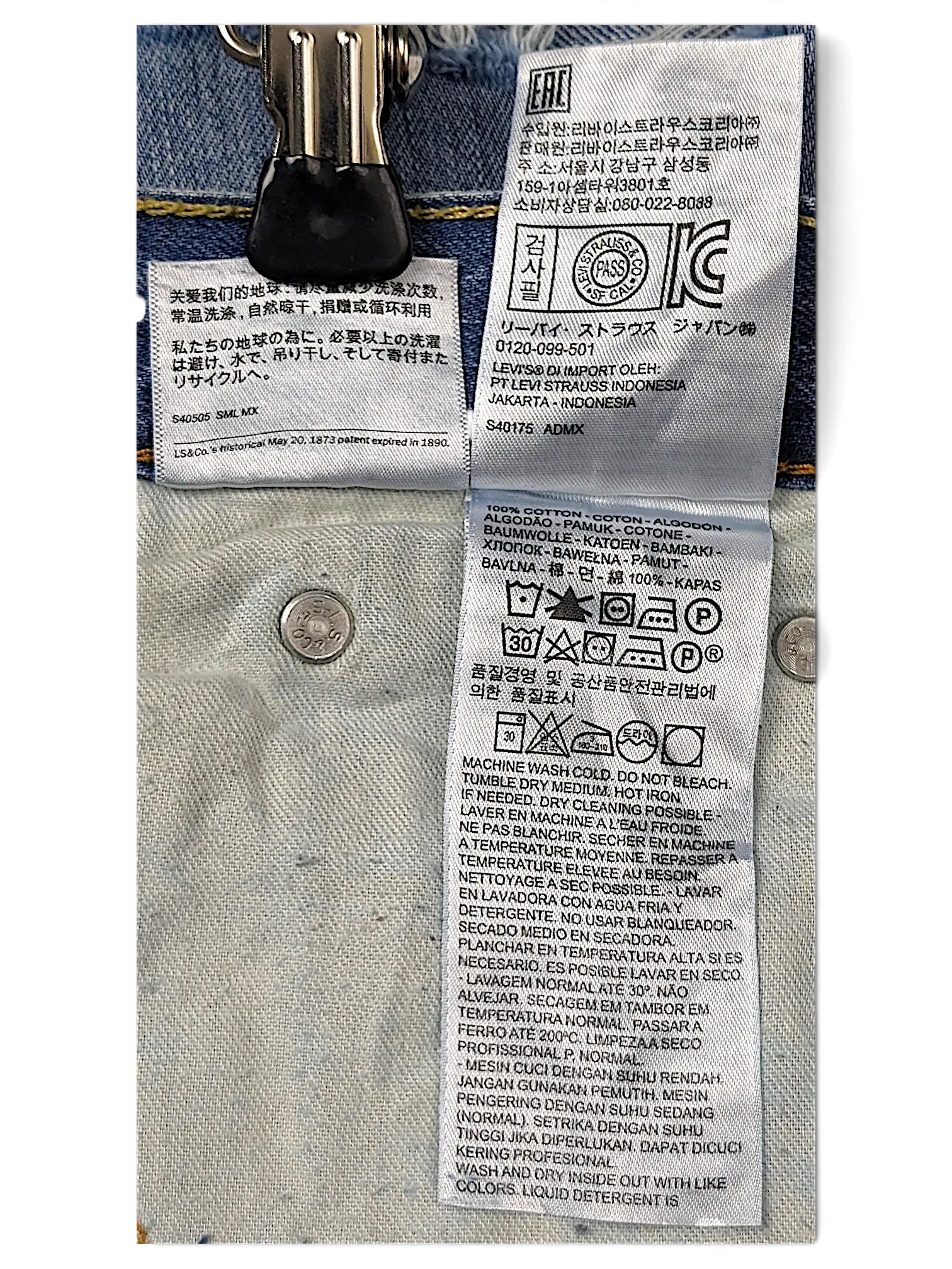 JAKE & IPI Levi's 511 ripped jeans interior care label with washing instructions and fabric composition details