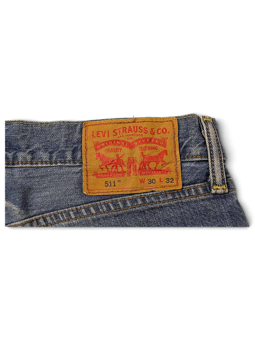 JAKE & IPI Levi's 511 blue denim jeans leather back patch showing size W30 L32